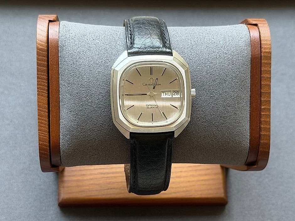 Omega Constellation Megaquartz day-date from 1976 on a suede watch stand